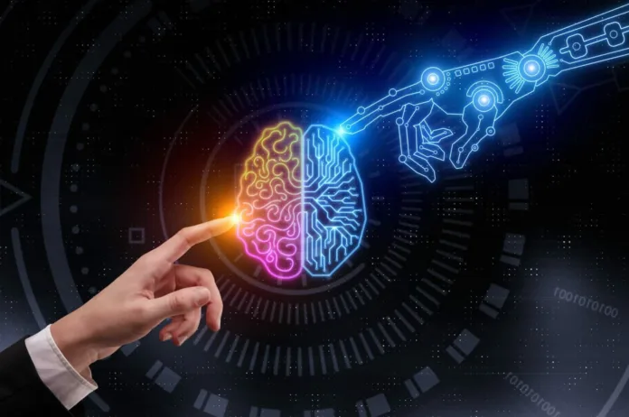 Human-AI-Collaboration Human-AI collaboration concept showing human hand and robotic hand connecting through a digital brain interface