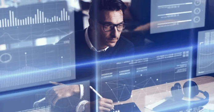 Top Tech Careers of the Future Futuristic workspace with a tech professional analyzing digital data on multiple screens, representing top tech careers of the future.